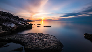 Sunset water rocks clouds horizon 2 - adam bruce thomson free wallpaper for desktop