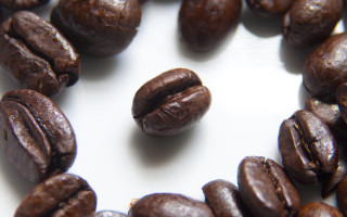 Coffee beans closeup photorealistic hyperrealism - scattered free wallpaper