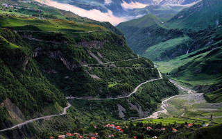 Scenic valley winding road mountains 2 - road in the middle of it free wallpaper