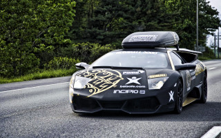 Black sports car gold accents - epic proportion free wallpaper