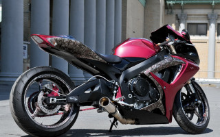 Red motorcycle building biker helmet - a red motorcycle free wallpaper