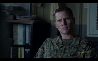 Military man serious uniform looking - a dark room free wallpaper