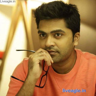 Man glasses sitting serious looking - still free wallpaper for tablet