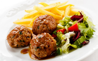 Plate meatballs fries salad dressing - a plate of food free wallpaper