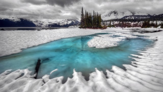 Frozen river mountains snow trees - rich moody colour free wallpaper