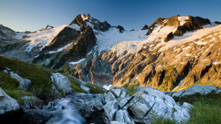 Mountain range stream grassy landscape 2 - a stream running free wallpaper
