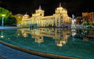 Night cityscape reflection tower fountain - a fountain in front free wallpaper