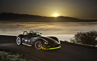 Black sports car sunset fog - the air behind free wallpaper
