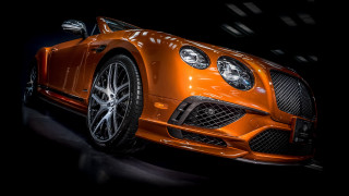 Orange car headlights black background - free 3d render wallpaper