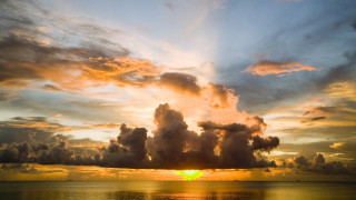 Sunset clouds ocean reflection dusk - colorful cloud free wallpaper