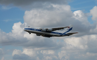 Large jetliner cloudy sky blue 2 - blue sky free wallpaper