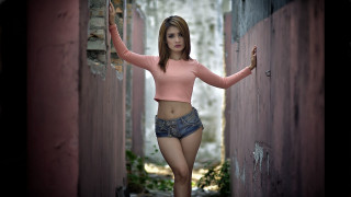 Woman pink shirt shorts alleyoutstretched - a narrow alley way free wallpaper