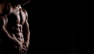 Masculine marble sculpture dark pose - a picture in the dark free wallpaper