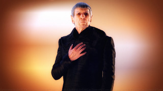 Man folded hands yellow background - dean roger free wallpaper