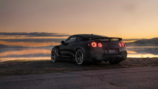 Black sports car lake sunset - fog in the background free wallpaper