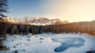 Snowy mountain lake forest sunset 2 - a forest in the background free wallpaper