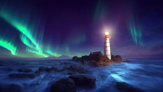 Lighthouse green light ocean rocks - green light free wallpaper