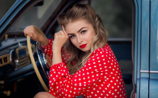 Woman red polka dot car - steering free wallpaper