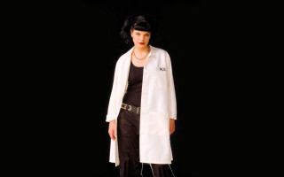 Woman white coat black pants 3 - a white coat free wallpaper