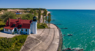 Lighthouse cliff ocean beach tiltshift - the ocean and a beach free wallpaper
