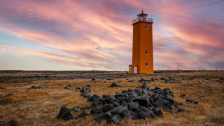 Red lighthouse dry grass rocks - a dry grass field next free wallpaper