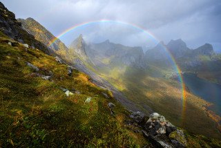 Rainbow mountain lake mystical colors 2 - a lake in the foreground and a mountain range in the background free wallpaper
