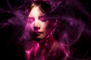 Woman blowing hair pink smoke - airbrush free wallpaper
