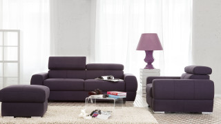 Livingroom purple couch chair lamp - a white rug free wallpaper