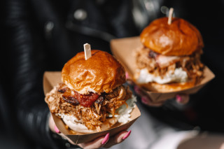 Person holding two pulledpork sandwiches - dave allsop free wallpaper