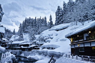 Snowy resort stream trees buildings - the other side free wallpaper