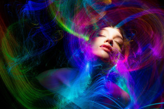 Woman closed eyes psychedelic hologram - light streak free wallpaper