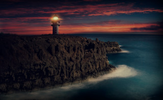 Lighthouse cliff red sky water - atmospheric free wallpaper for desktop