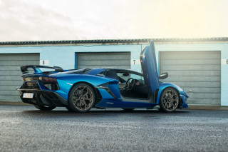 Blue sports car garage open 2 - the door open free wallpaper