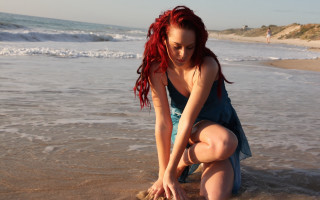 Woman kneeling beach frisbee water - daphne mcclure free wallpaper