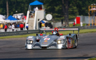 Racecar stand clocktower motionblur 3d - the stand behind free wallpaper