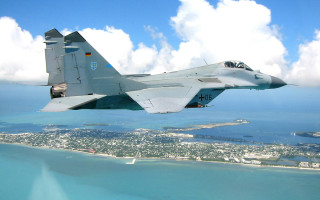 Jet city water sky clouds - a jet free wallpaper