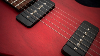 Red guitar black neck strings - a red guitar free wallpaper