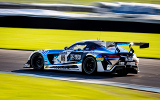 Car race track grass sky - motion blur free wallpaper