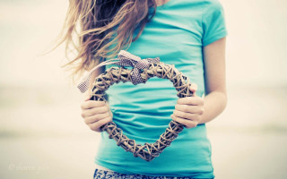 Girl holding heart animal print - a girl holding free wallpaper