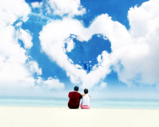 Couple beach heart cloud sky - a couple sitting free wallpaper