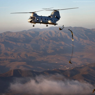 Helicopter mountain parachute man dangling - free other wallpaper