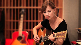 Woman playing guitar studio red - a red chair free wallpaper