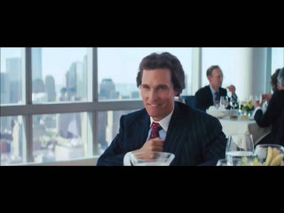 Man suit tie sitting table - movie scene free wallpaper