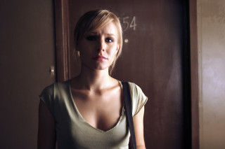 Woman standing doorway handbag shoulder - a handbag free wallpaper