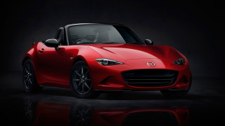 Red sports car dark room 67 - a reflection free wallpaper