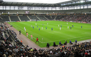 Soccer field crowd stands middle - the field free wallpaper