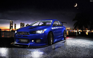Blue car wet road night - rim free wallpaper