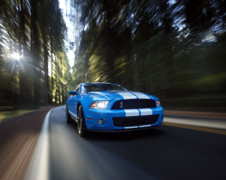 Blue mustang car driving road 2 - the background and a sunbeam free wallpaper