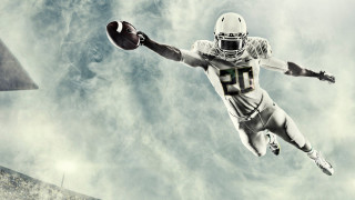 Football player air ball cloudy - a football player free wallpaper