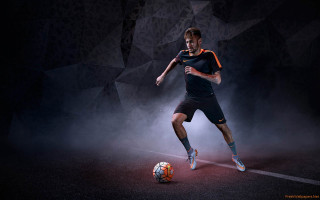 Man kicking soccer ball dark - the ball free wallpaper